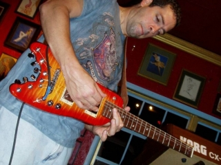Endorser Albert Castiglia wailing on his Rambler Professional Travel Guitar