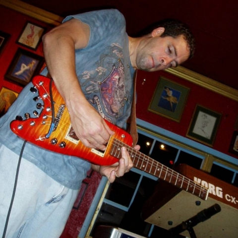 Endorser Albert Castiglia wailing on his Rambler Professional Travel Guitar