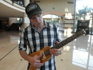 Joe Bonamassa check out a Rambler Travel Guitar