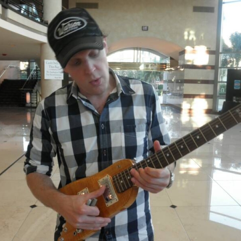 Joe Bonamassa check out a Rambler Travel Guitar