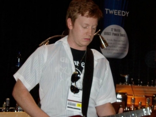John Justice playing a Rambler Portable Guitar