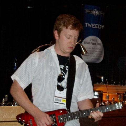 John Justice playing a Rambler Portable Guitar