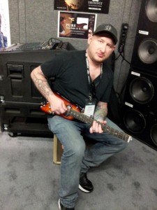 Josh Smith with his Strobel Rambler® Travel Guitar at NAMM 2014