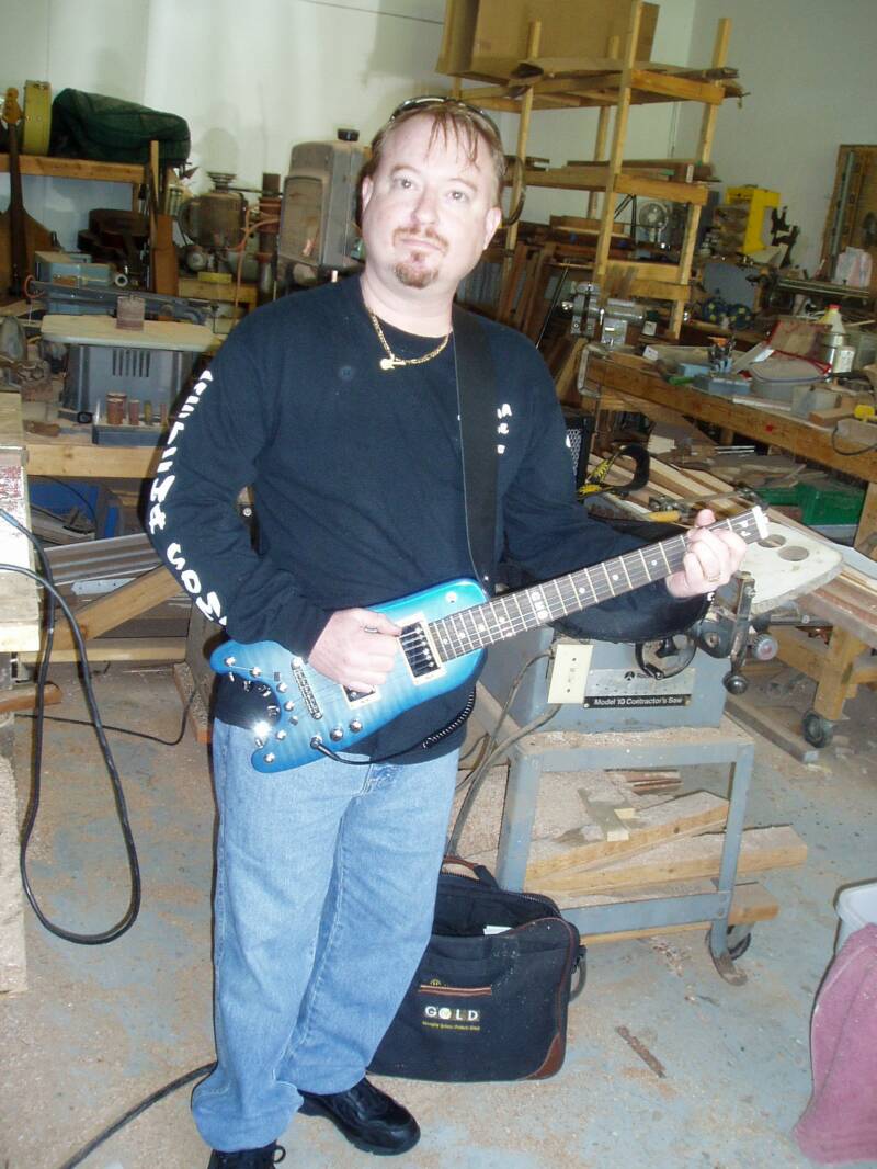 PJ Picking up his custom Pearly Blue Custom Rambler