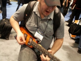 Pete G. checking out the Rambler Guitar at NAMM