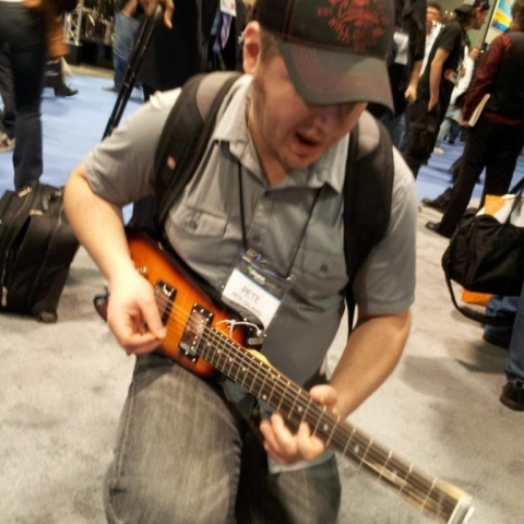 Pete G. checking out the Rambler Guitar at NAMM