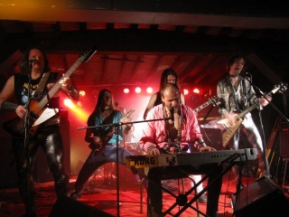 Rocking on stage in Sweden with a Rambler Professional Travel Guitar