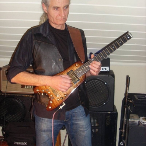 Rambler Professional Electric Travel Guitar at band practice