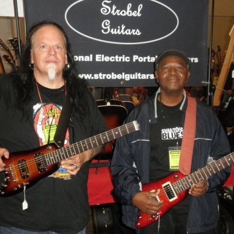 Smokin' Joe with Bnois with thier Rambler Travel Guitars