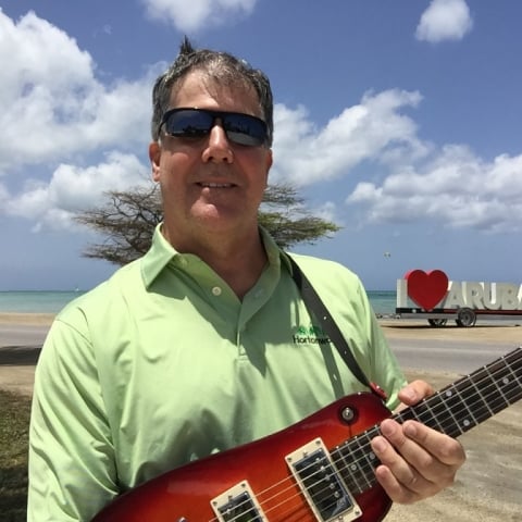 Brett with his Rambler Travel Guitar in Aruba