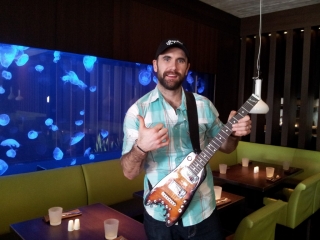Jay Harrison of Winnepeg Jets with his new Rambler Travel Guitar