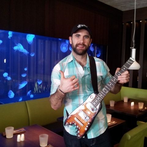 Jay Harrison of Winnepeg Jets with his new Rambler Travel Guitar