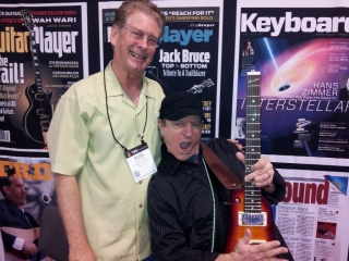 Mike Molenda from Guitar Player hamming it up with a Rambler Travel Guitar