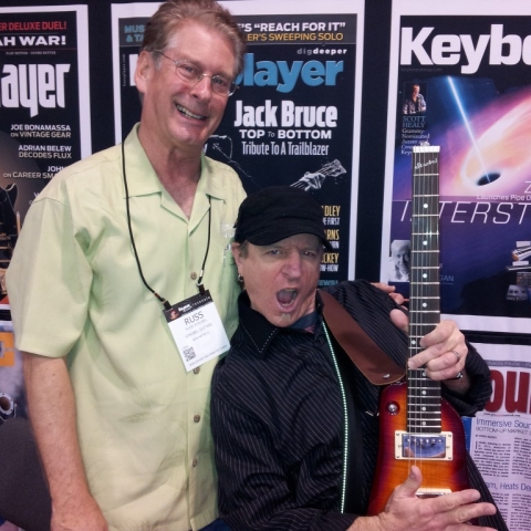 Mike Molenda from Guitar Player hamming it up with a Rambler Travel Guitar