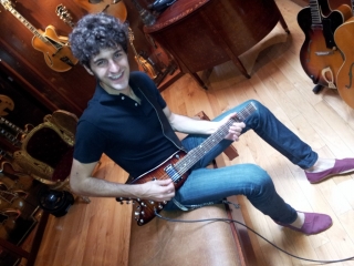 Playing a Rambler Travel Guitar at Rudy's in SOHO