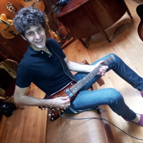 Playing a Rambler Travel Guitar at Rudy's in SOHO