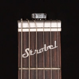 Rambler Travel Guitar patented StringKeeper