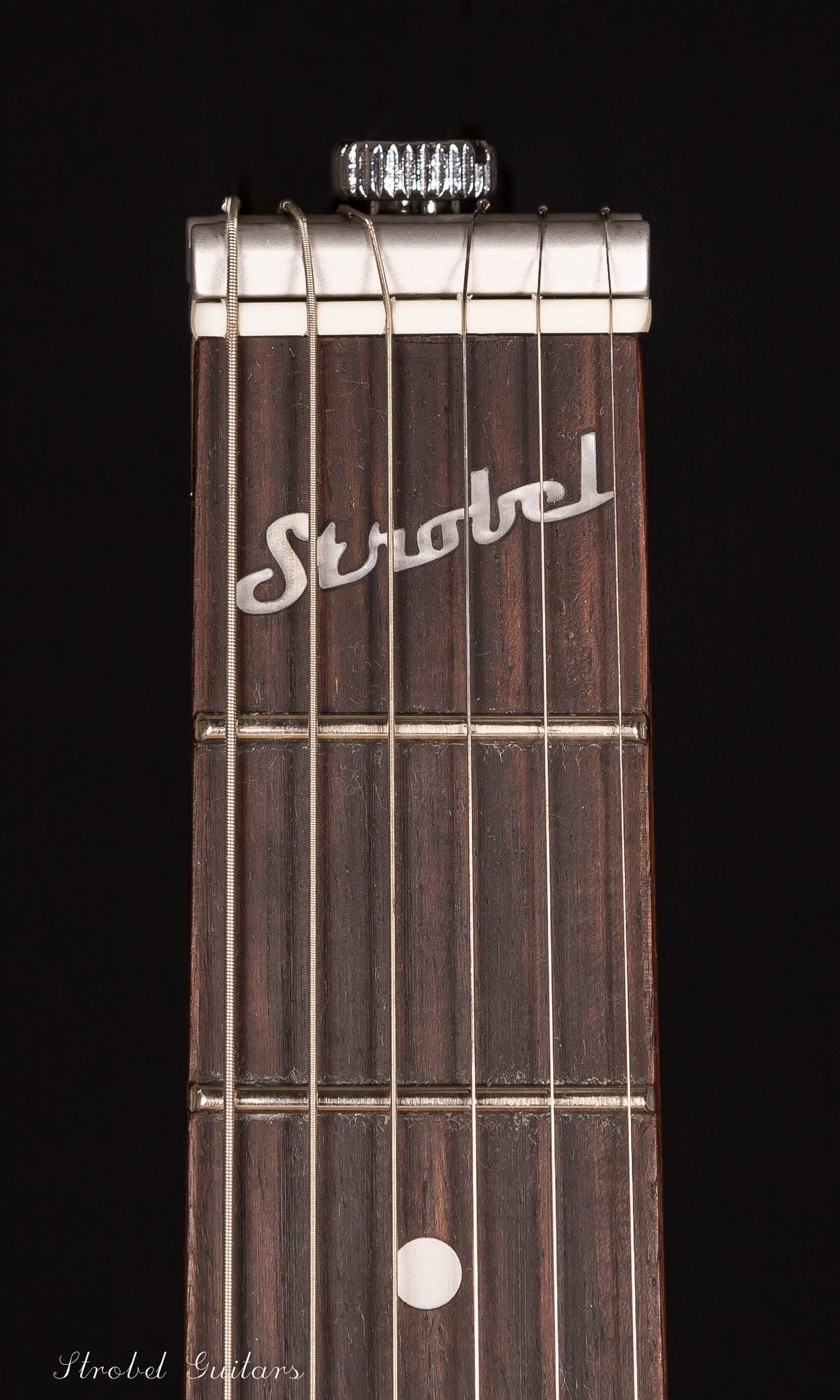 Rambler Travel Guitar patented StringKeeper